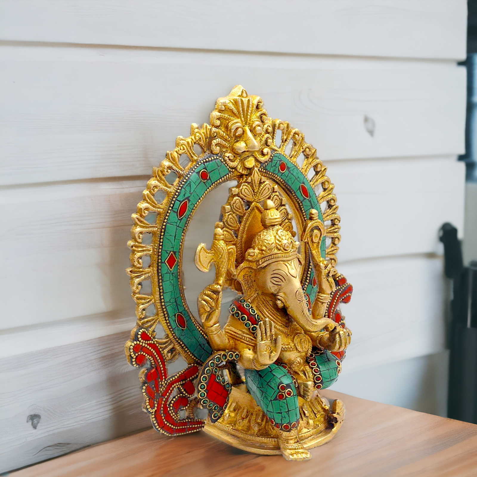 Buy Ganesha Sitting Brass with Stone Work statue - 9 nches Nikuressence