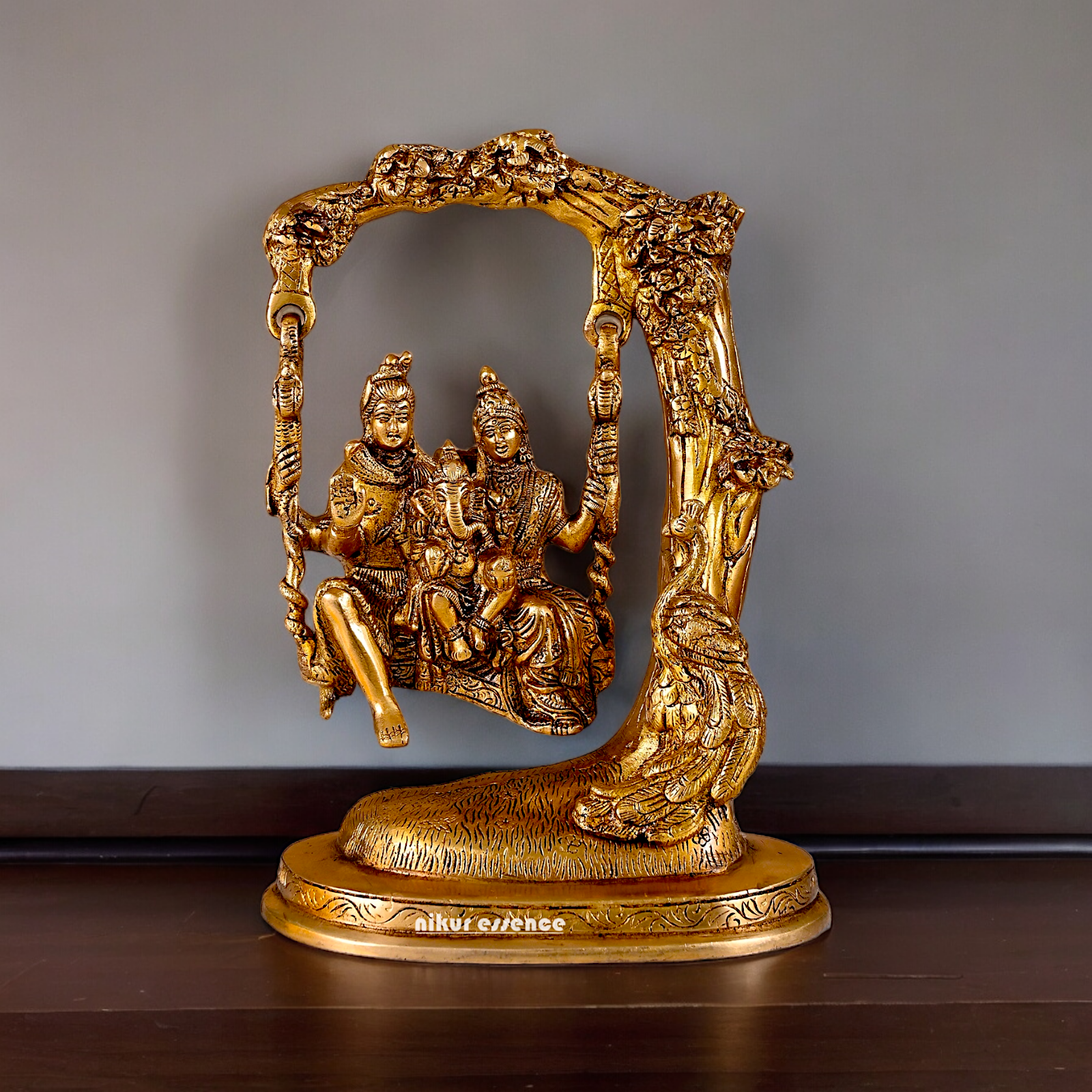 Solid Brass Shiva Parvati and Ganesh Family Sitting on Swing Jhula idol - 9.50 inches Nikuressence