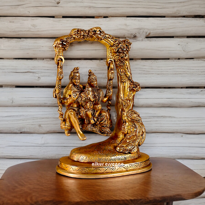 Solid Brass Shiva Parvati and Ganesh Family Sitting on Swing Jhula idol - 9.50 inches Nikuressence