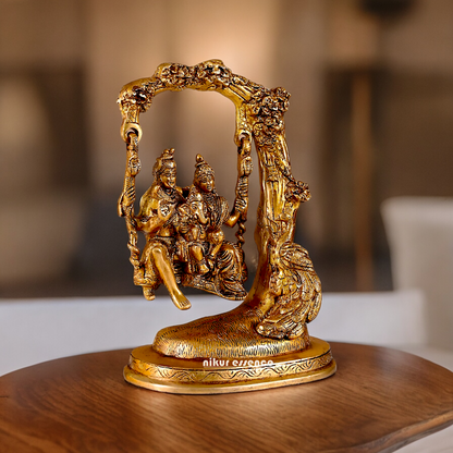 Solid Brass Shiva Parvati and Ganesh Family Sitting on Swing Jhula idol - 9.50 inches Nikuressence