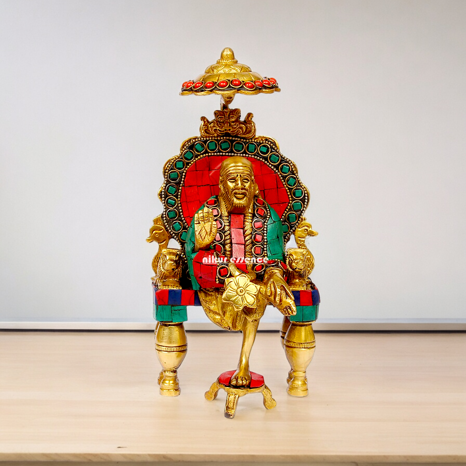 Online Sai Baba Sitting with Blessing Brass Stone Work Idol - 8 inch Nikuressence