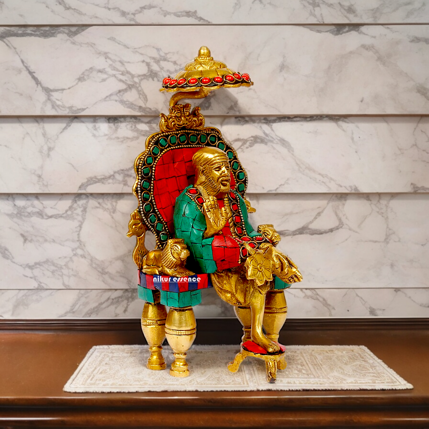 Online Sai Baba Sitting with Blessing Brass Stone Work Idol - 8 inch Nikuressence