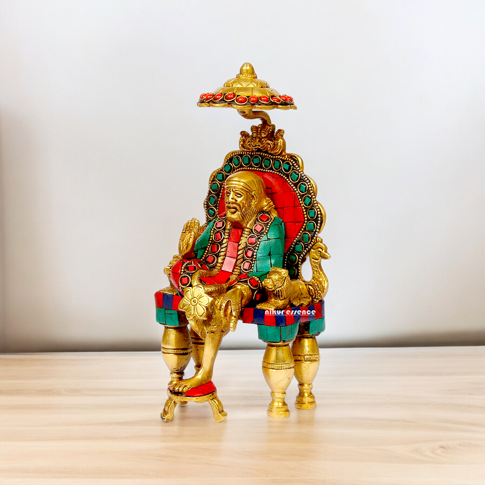 Online Sai Baba Sitting with Blessing Brass Stone Work Idol - 8 inch Nikuressence