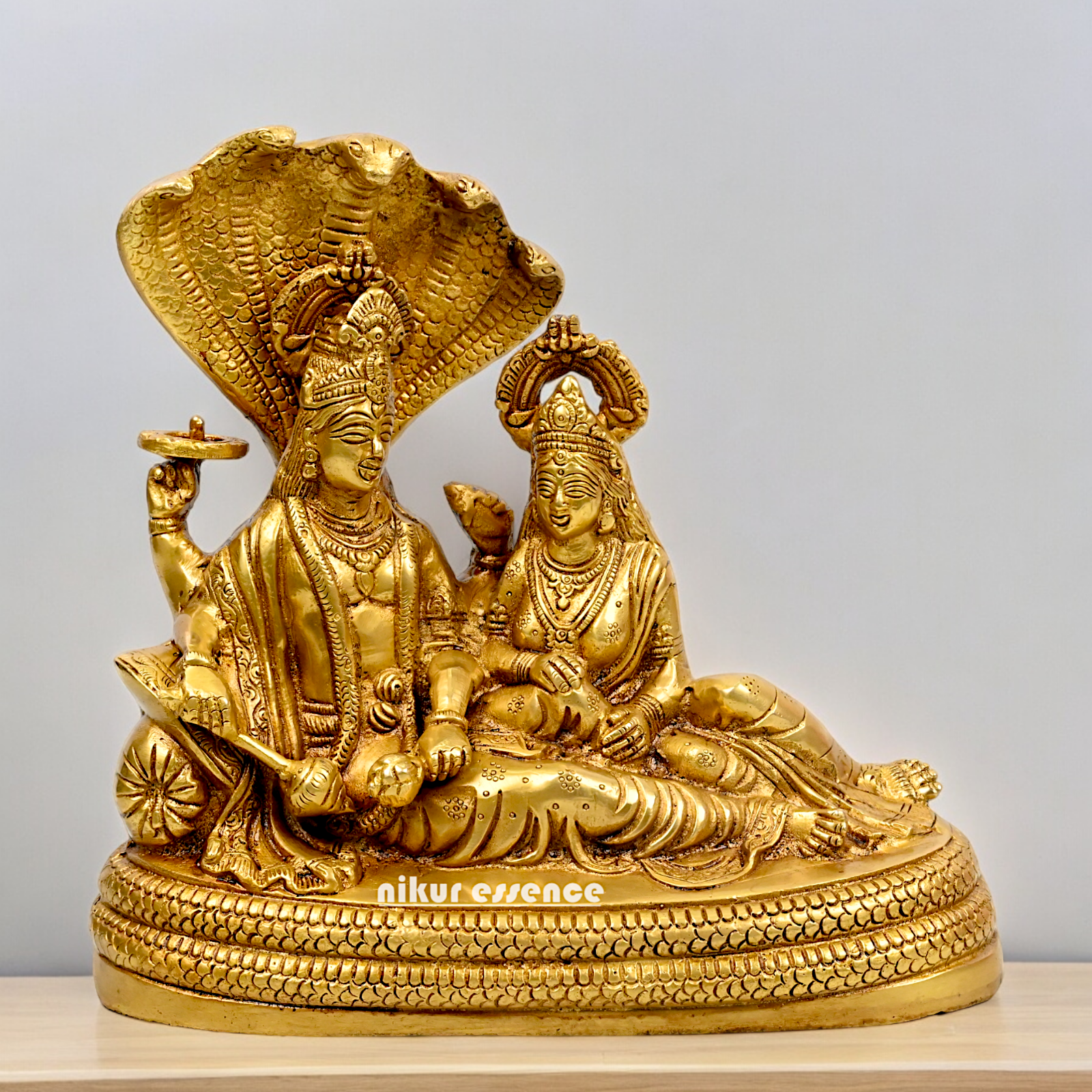 Large Vishnu and Lakshmi Sitting on Sheshnag idol solid brass - 10 inches Nikuressence