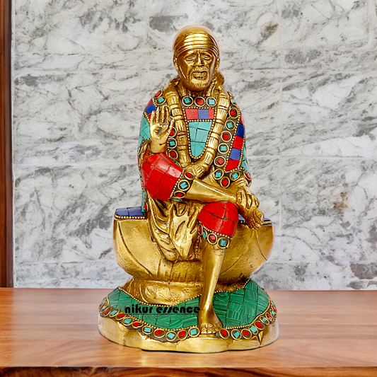 Lord Sai Baba Sitting Idol with Stone Work - 8 Inches Nikuressence