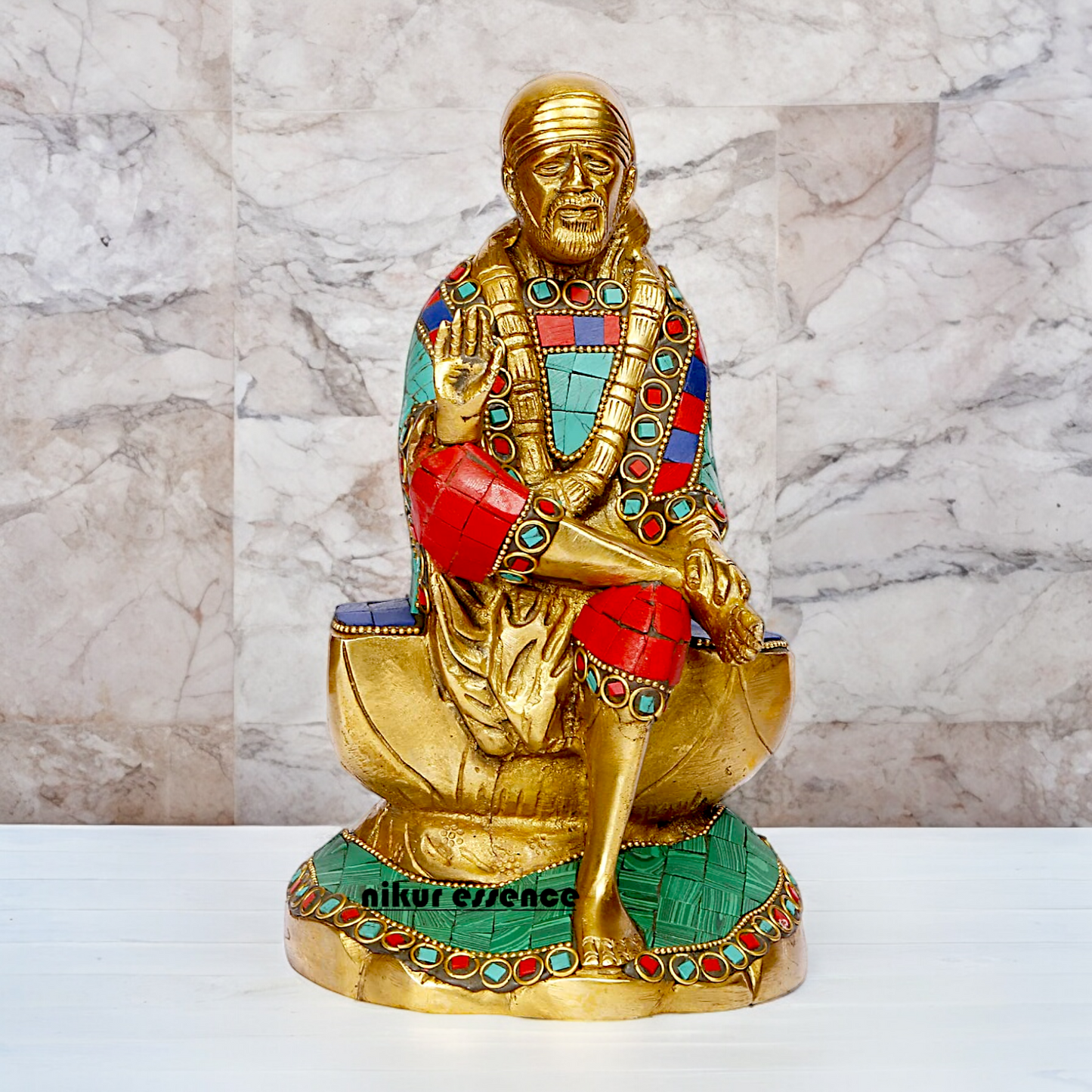 Lord Sai Baba Sitting Idol with Stone Work - 8 Inches Nikuressence