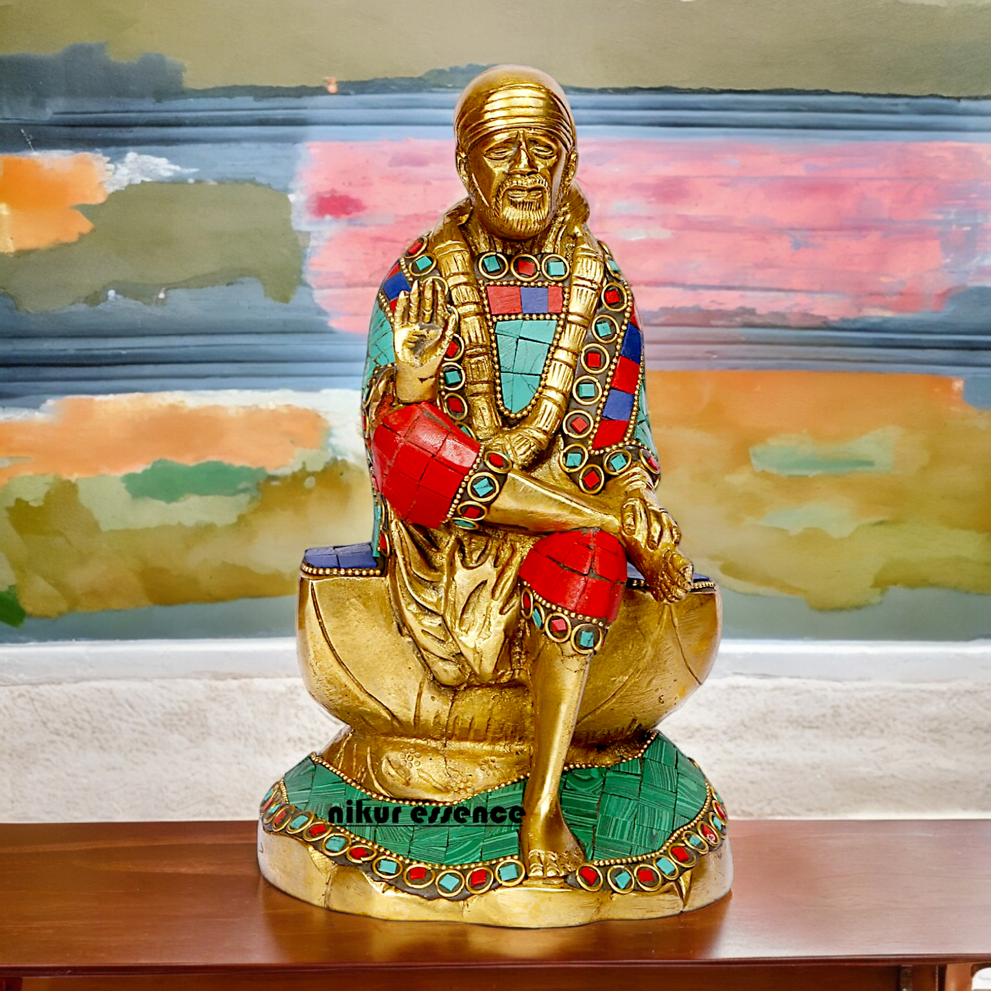 Lord Sai Baba Sitting Idol with Stone Work - 8 Inches Nikuressence