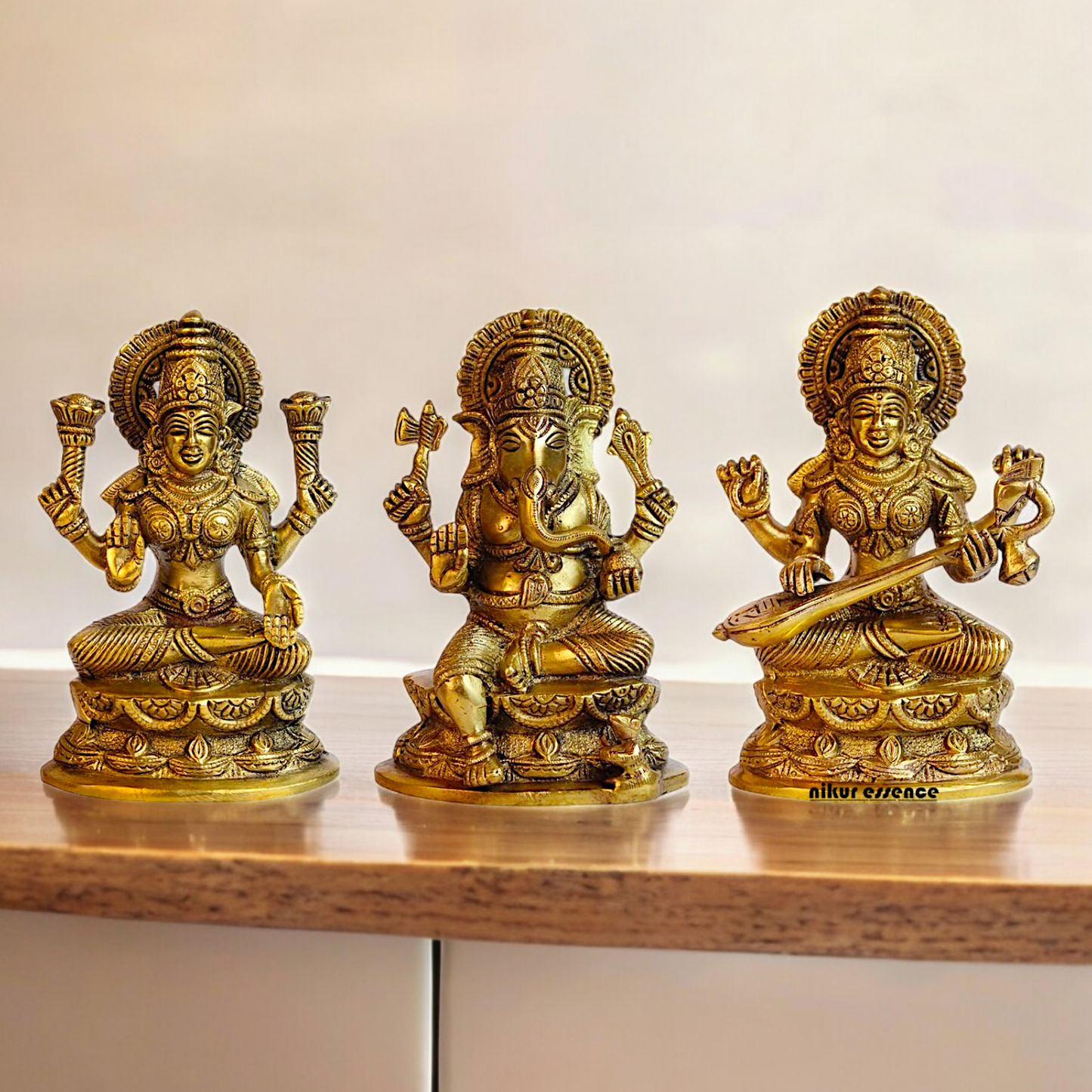Buy Brass Lakshmi Ganesh Saraswati Beautiful Idol - 7 inches Nikuressence