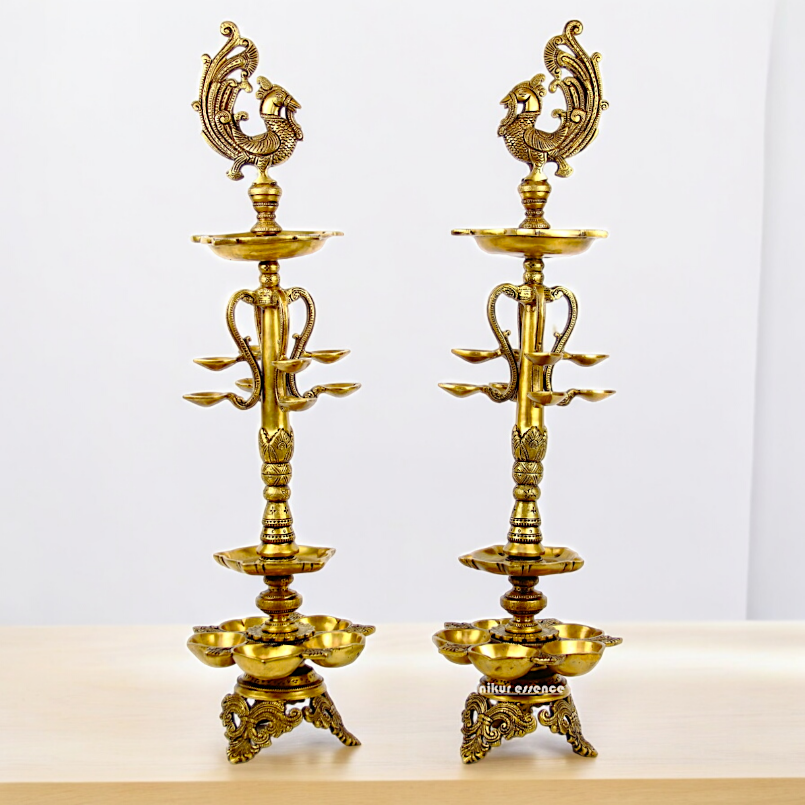 Shop Large Brass Peacock Diya Pair - 27.5 inches Nikuressence
