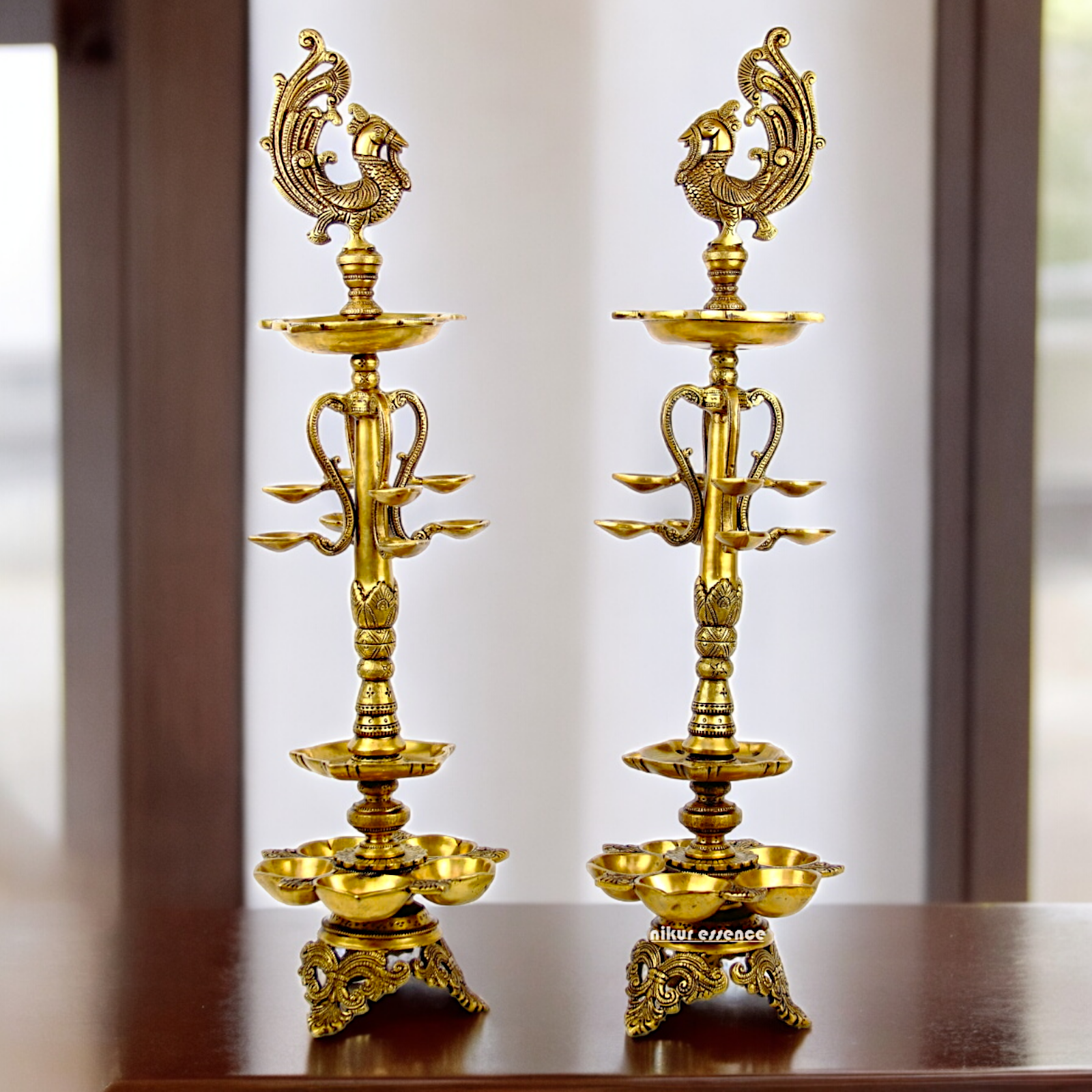 Shop Large Brass Peacock Diya Pair - 27.5 inches Nikuressence