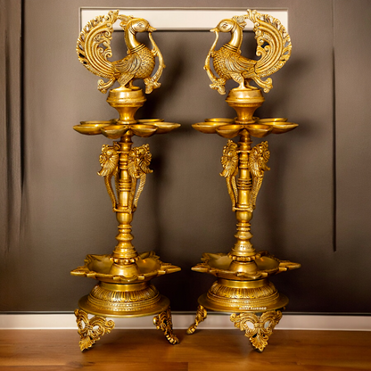 Buy Solid Brass Pair Peacock diya - 23 inches Nikuressence