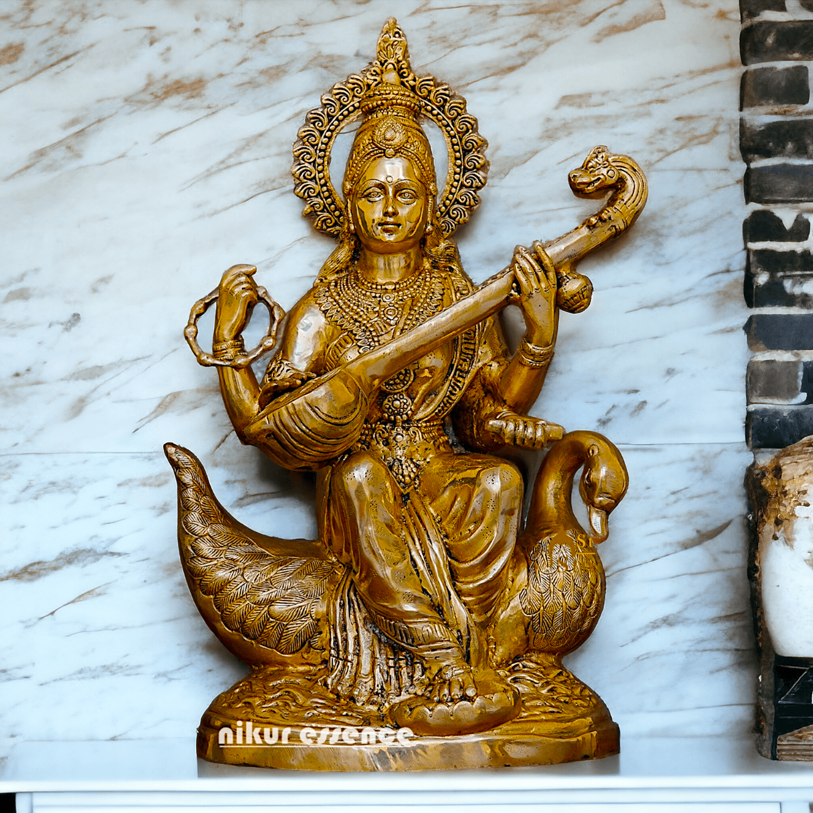 Statue of Hindu in brass Maa Saraswati, Depicted Riding a Swan and Playing the Veena, Symbolizing Wisdom, Arts, and Learning in Hindu Mythology Nikuressence