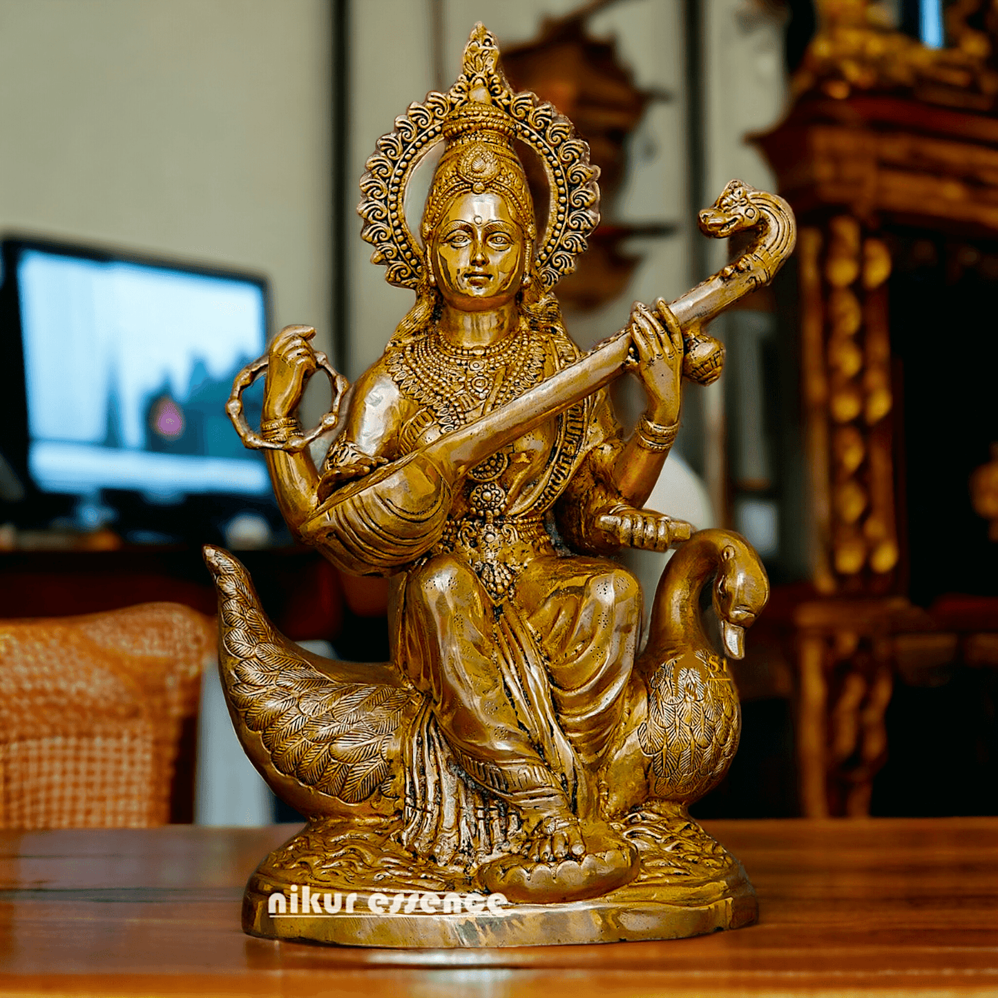 Statue of Hindu in brass Maa Saraswati, Depicted Riding a Swan and Playing the Veena, Symbolizing Wisdom, Arts, and Learning in Hindu Mythology Nikuressence