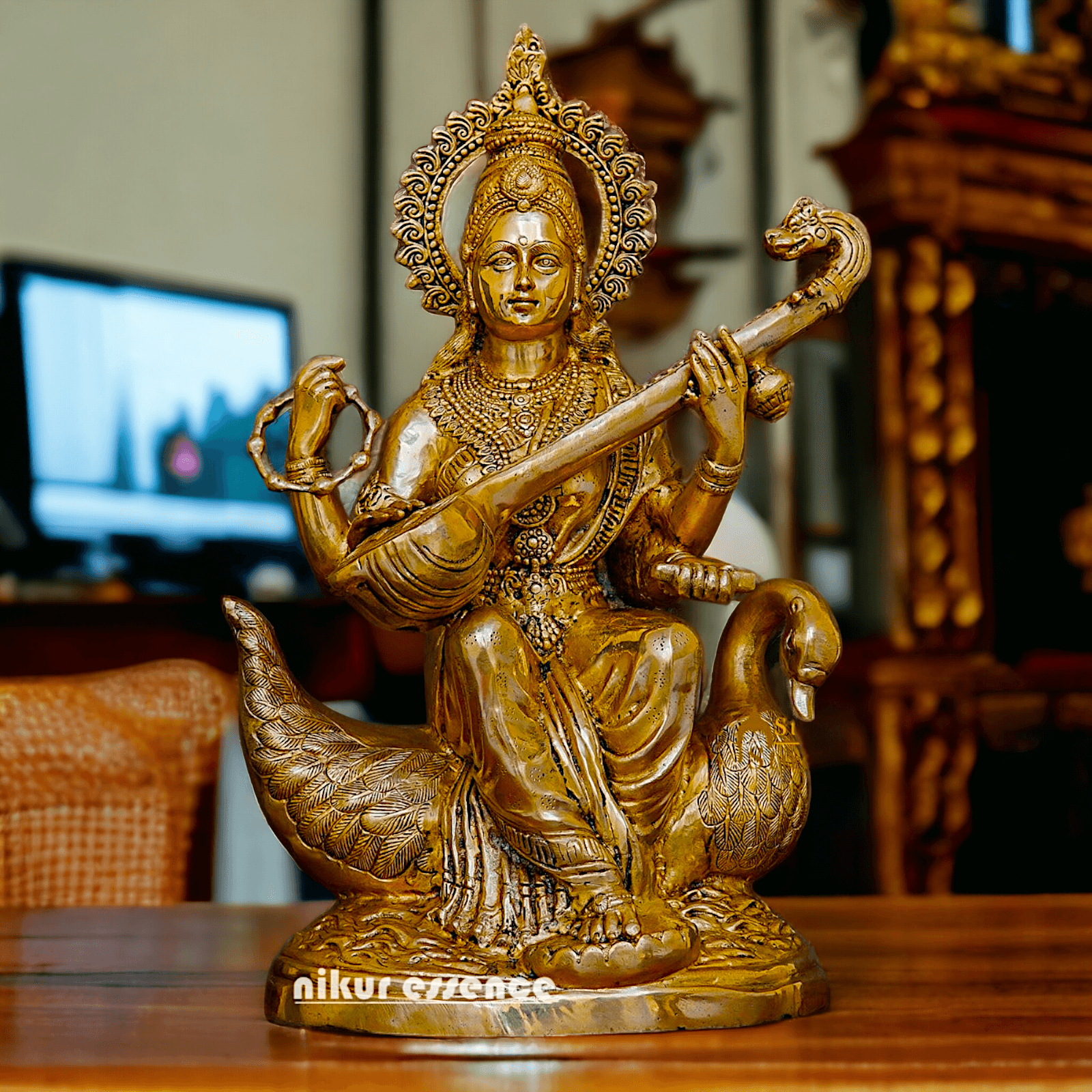 Statue of Hindu in brass Maa Saraswati, Depicted Riding a Swan and Playing the Veena, Symbolizing Wisdom, Arts, and Learning in Hindu Mythology Nikuressence