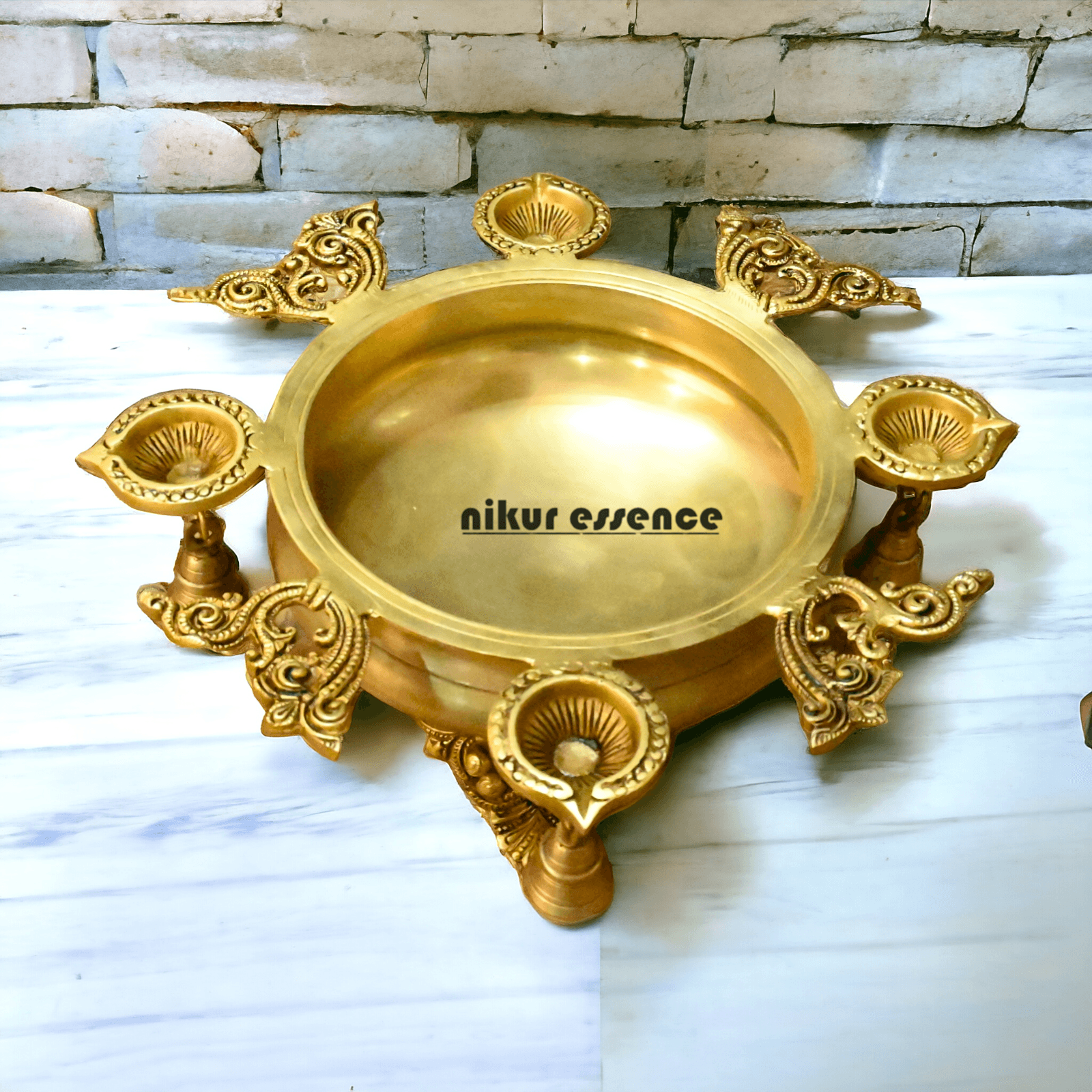 Buy Brass Urli Bowl with 4 Diya Holders and Decorative Bells – Traditional Indian Ritual and Home Décor Piece Nikuressence