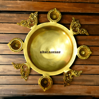 Buy Brass Urli Bowl with 4 Diya Holders and Decorative Bells – Traditional Indian Ritual and Home Décor Piece Nikuressence