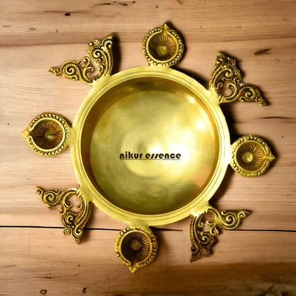 Buy Brass Urli Bowl with 4 Diya Holders and Decorative Bells – Traditional Indian Ritual and Home Décor Piece Nikuressence