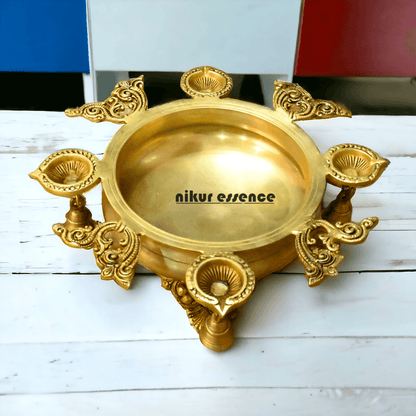 Buy Brass Urli Bowl with 4 Diya Holders and Decorative Bells – Traditional Indian Ritual and Home Décor Piece Nikuressence