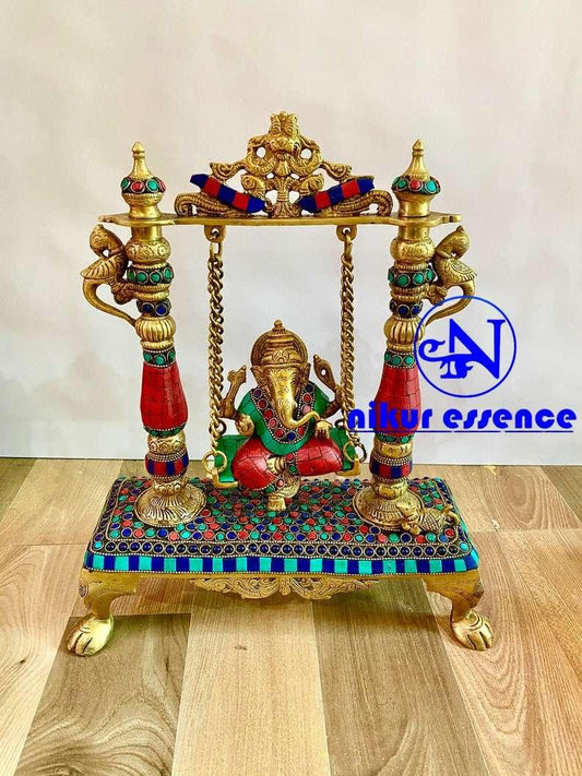 Ganesha Swing Brass Statue with Breathtaking Stone Work, Delicate Patterns, and a Serene Expression Nikuressence